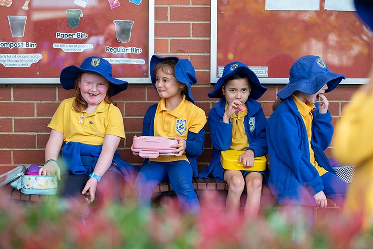 Girls eating lunch outside